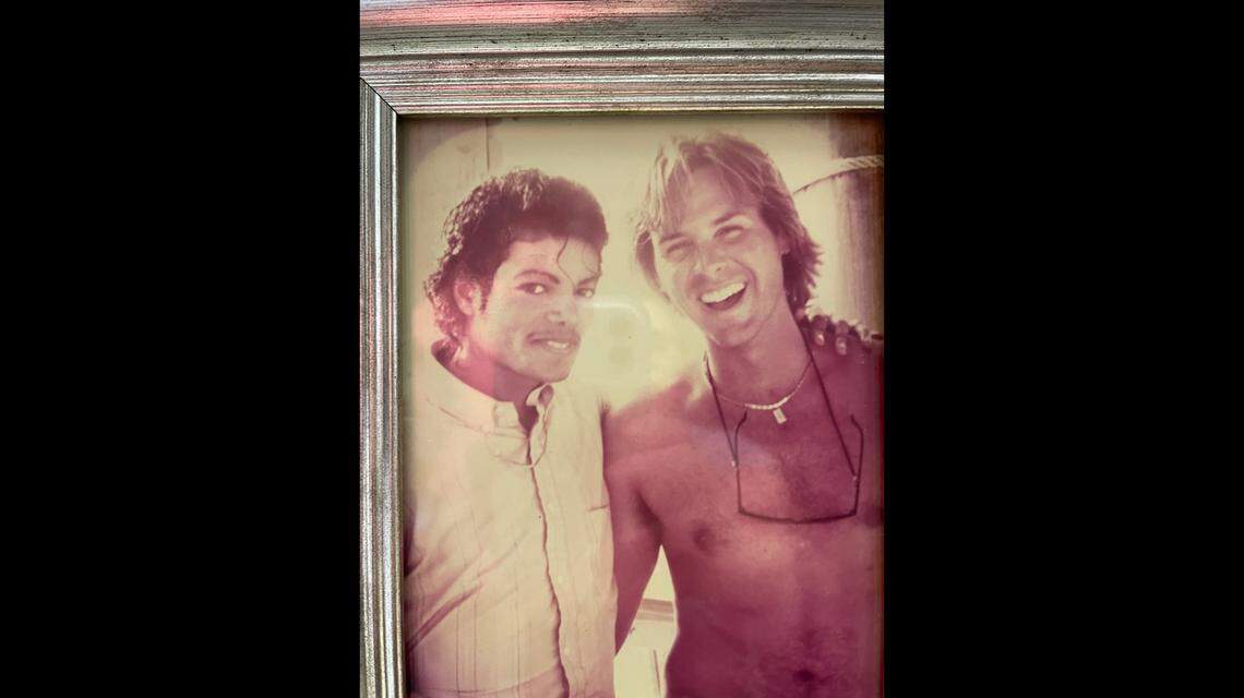 Charles Burkett with Michael Jackson in the early 1980s. Burkett, now the Surfside mayor, says he taught Jackson to water ski when Burkett was living at his grandmother’s mansion in Miami Beach.