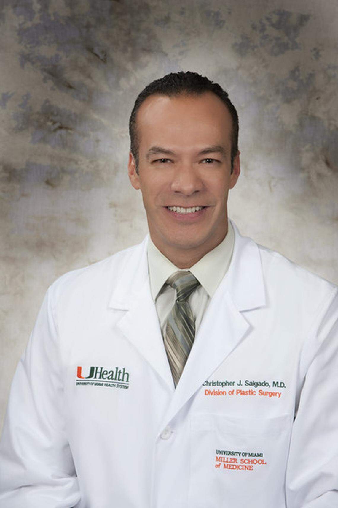 Dr. Christopher Salgado, Interim Chief of Plastic Surgery and Medical Director at the LGBTQ Center for Wellness, Gender, and Sexual Health