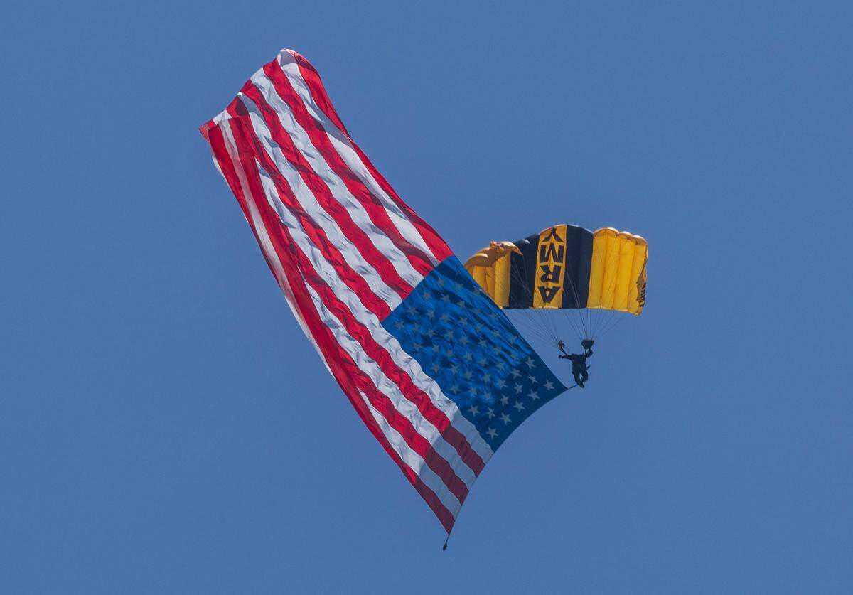 A U.S. Army Golden Knights parachutist prepares to land on South Beach during the Hyundai Air & Sea Show, part of Miami Beach’s annual National Salute to America’s Heroes, on Saturday, May 24, 2025.