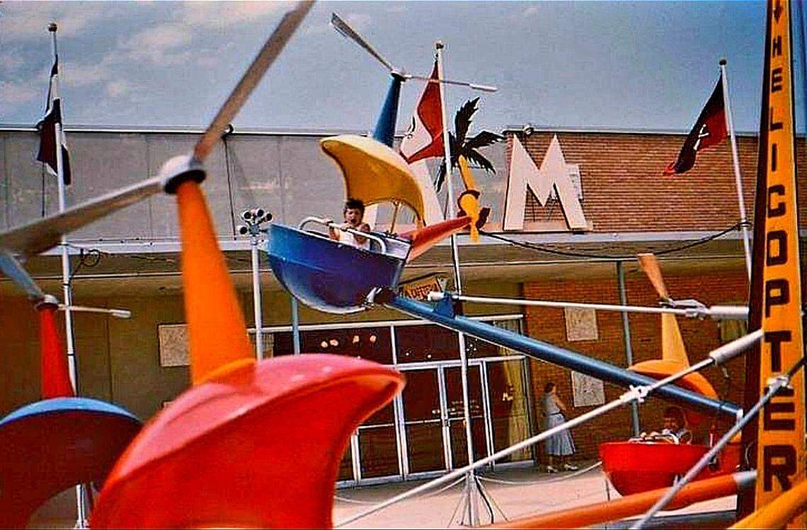 The Kiddie Park at the 163rd Street Shopping Center had an amusement park, like these helicopter rides, when the North Miami-Dade mall opened in November 1956. By 1980, construction began to enclose the mall and the outdoor amusement had been confined to history pages. The center was also renamed The Mall at 163rd Street.