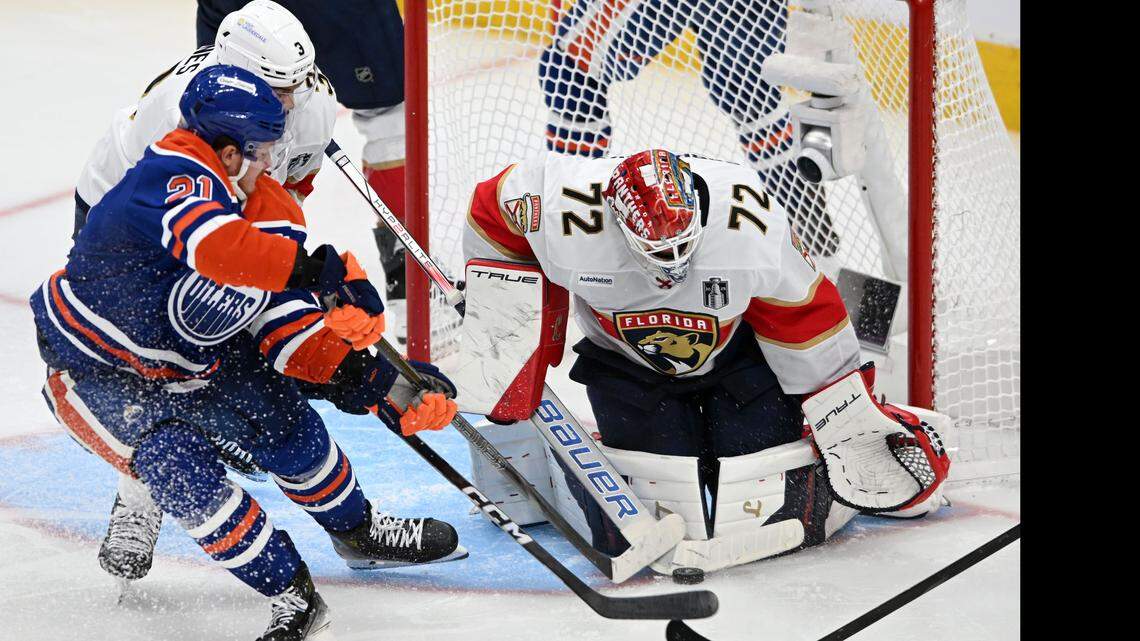Jun 6, 2025; Edmonton, Alberta, CAN; Edmonton Oilers center Trent Frederic (21) shoots on Florida Panthers goaltender Sergei Bobrovsky (72) during overtime in game two of the 2025 Stanley Cup Final at Rogers Place. Mandatory Credit: Walter Tychnowicz-Imagn Images