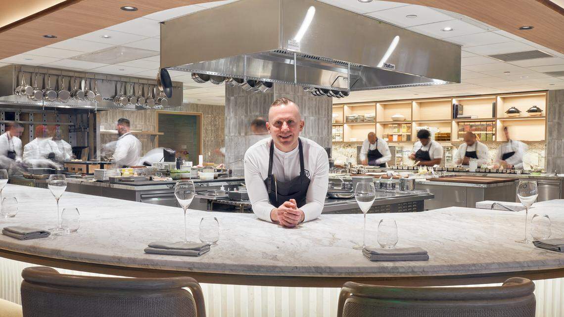 Chef Ryan Ratino at the chef's counter at MAASS, where fine dining awaits Fort Lauderdale visitors.