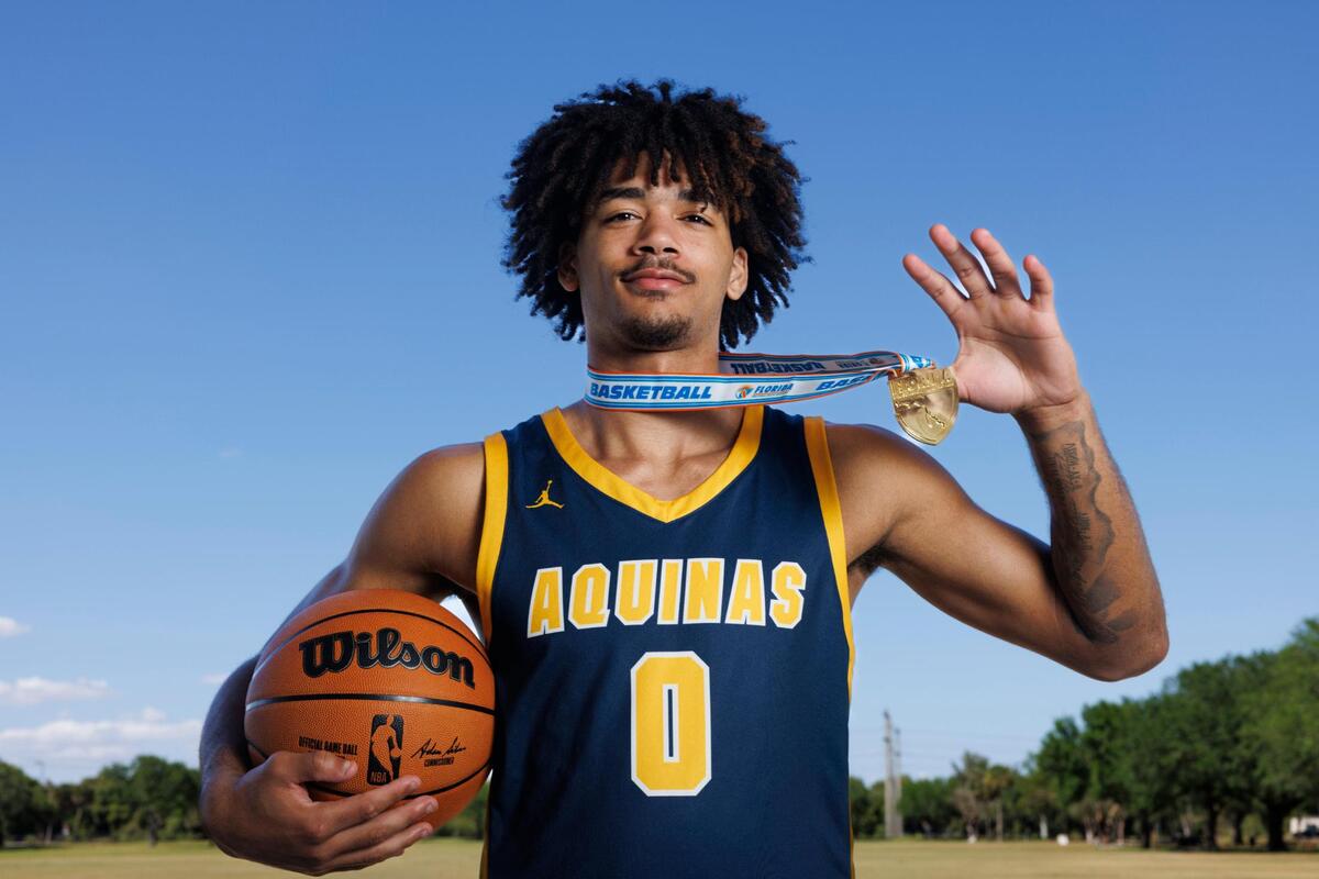 Dwayne Wimbley Jr., basketball player from St. Thomas Aquinas, poses for a photo during a Players of the Year photoshoot for Broward County on Wednesday, March 19, 2025, at Brian Piccolo Park in Hollywood, Fla.