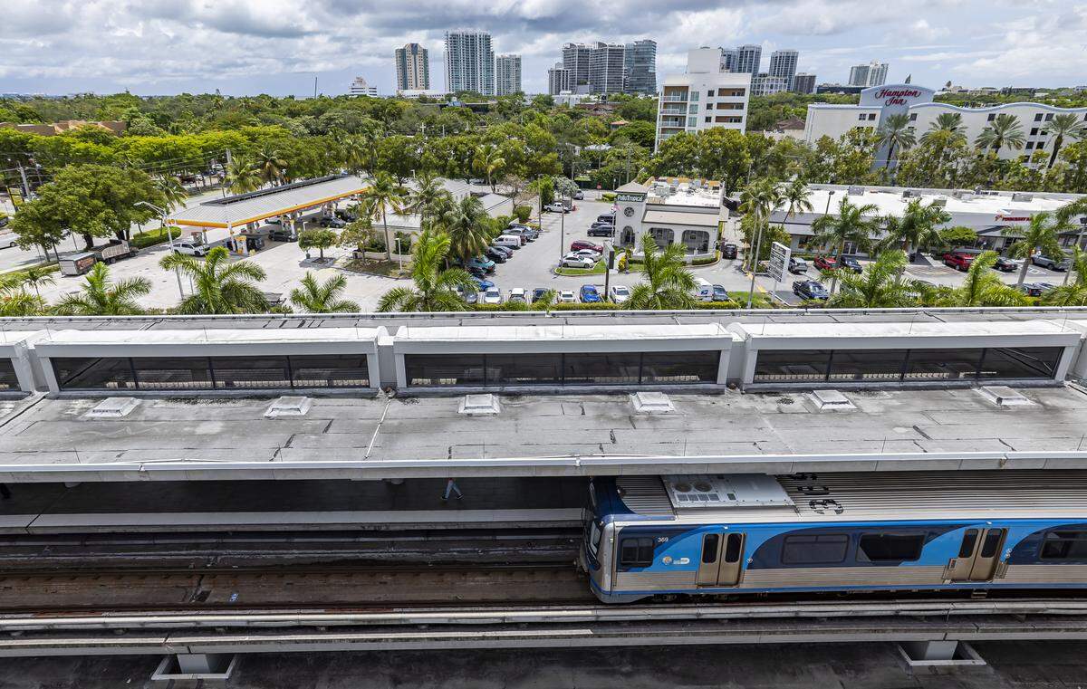A Metrorail train departs the Coconut Grove Station on Thursday, Aug. 7, 2025, in Miami.