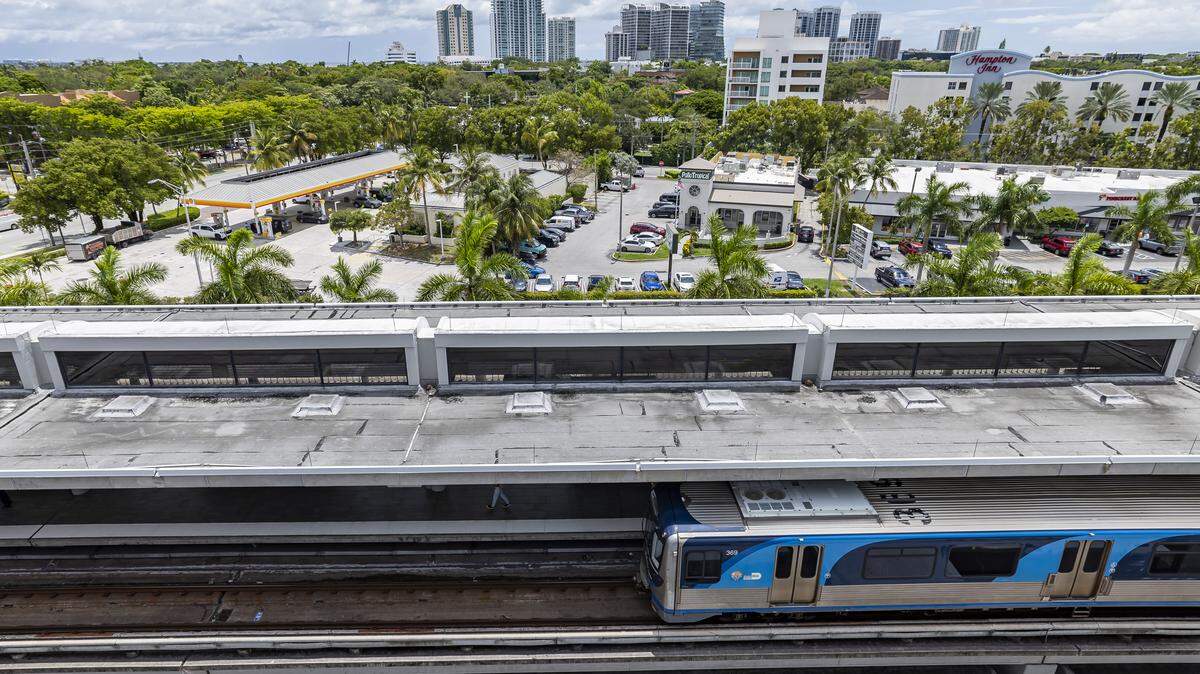 A Metrorail train departs the Coconut Grove station on Thursday, Aug. 7, 2025, in Miami.