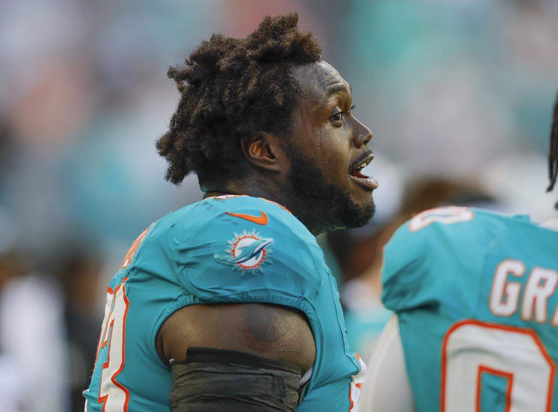 Miami Dolphins defensive tackle Zeek Biggers (93) reacts after blocking a Tampa Bay Buccaneers field goal attempt during the first half of the NFL football game at Hard Rock Stadium in Miami Gardens, Florida, on Sunday, December 28, 2025.
