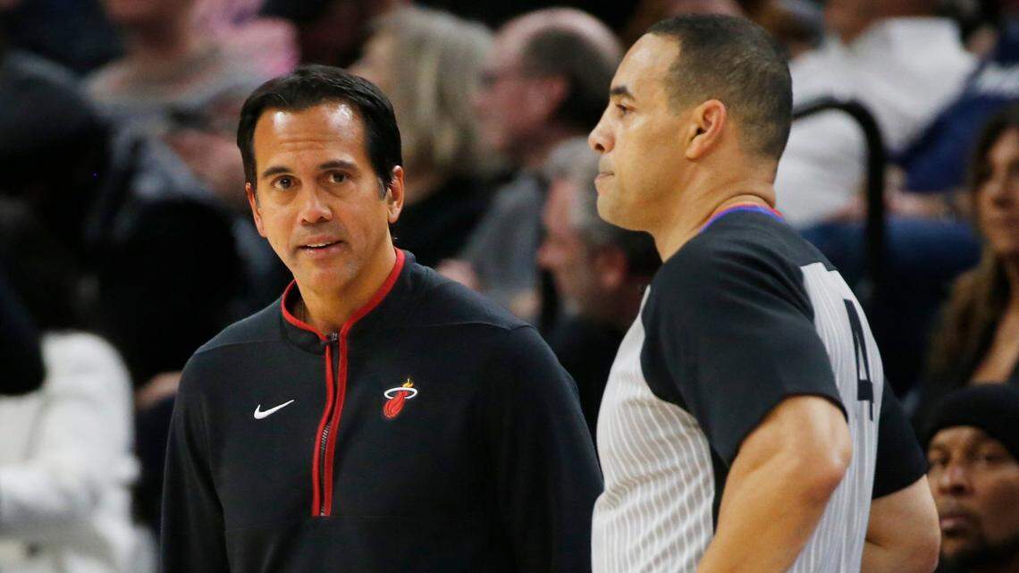 Miami Heat head coach Erik Spoelstra stares at referee Curtis Blair during the third quarter of an NBA basketball game with the Minnesota Timberwolves, Monday, Nov. 21, 2022, in Minneapolis. The Timberwolves won 105-101.