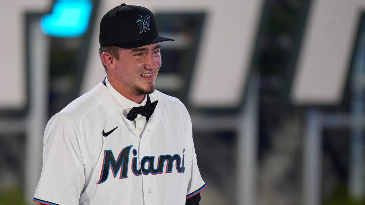Jacob Miller smiles after being selected by the Miami Marlins with the 46th pick of the 2022 MLB baseball draft, Sunday, July 17, 2022, in Los Angeles. (AP Photo/Jae C. Hong)
