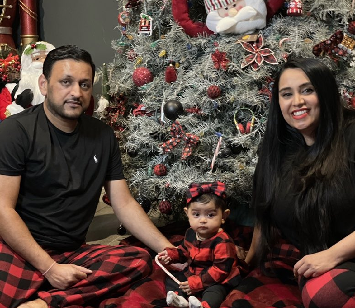 Vishal and Bhavna Patel and their 1-year-old daughter, Aishani. They are among the missing in the Surfside condo collapse.