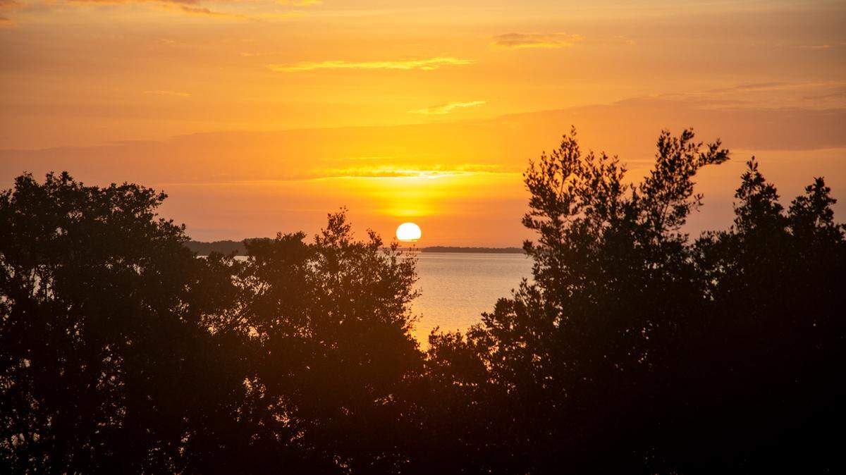 The sun rises over Florida Bay in Everglades National Park.