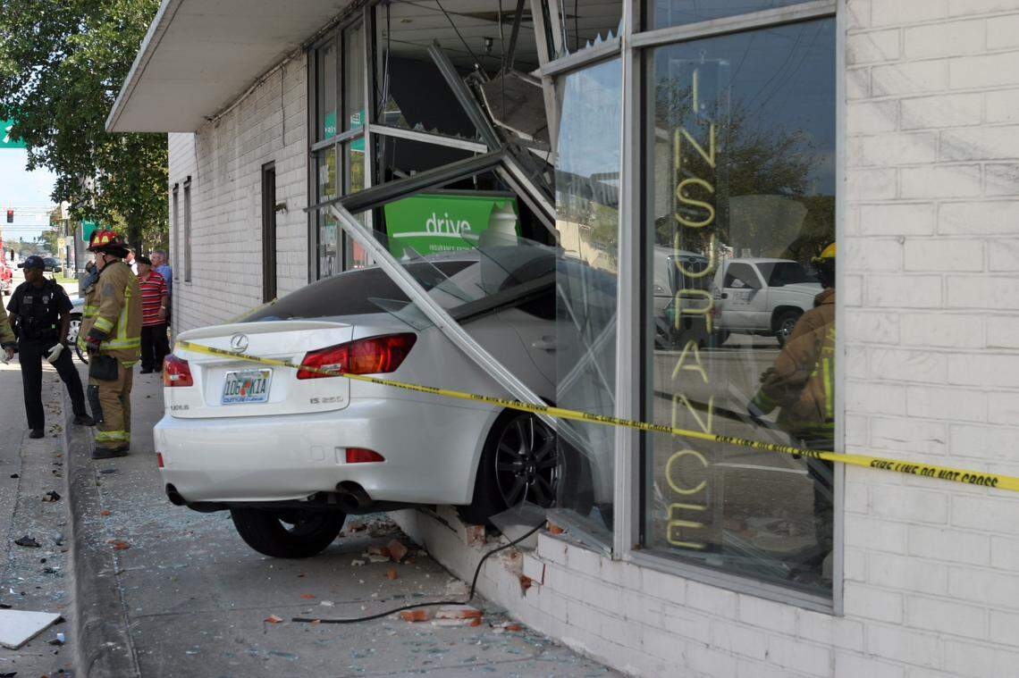 In this file photo from Feb. 27, 2009, a car has crashed through the window of an insurance business at East Sunrise Blvd and Flagler Drive in Fort Lauderdale.