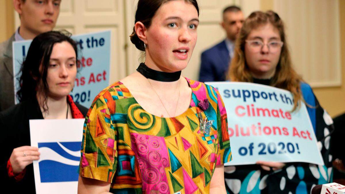 Kallan Benson, a student activist and a leader of Fridays for Future, speaks in support of legislation in Maryland to reduce greenhouse emissions statewide by 60% by 2030 during a news conference on Wednesday, Feb. 19, 2020, in Annapolis, Md.