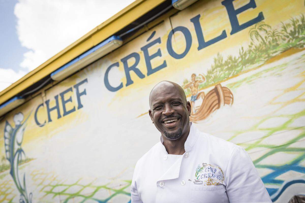 Wilkinson “Ken” Sejour in front of his restaurant in Little Haiti.