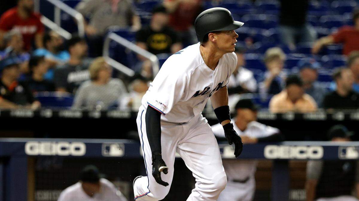 Miami Marlins right fielder Peter O’Brien hits an RBI single in the seventh inning of the Miami Marlins vs New York Mets, game at the Marlins Park in Little Havana in Miami on Tuesday April 02, 2019.