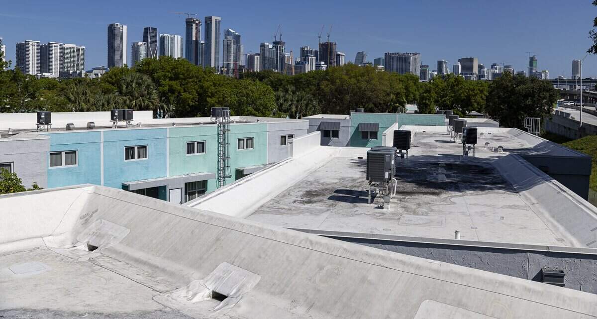 Sitting water can be see on the roof of the Town Park Plaza South residences on Friday, May 8, 2026, in Miami, Fla. Residents of the Section 8 housing community in Overtown are currently living with leaks, mold, and damage inside their homes following a failed renovation project and the community has now filed a lawsuit against the design-builder/general contractor and its roofing subcontractor.