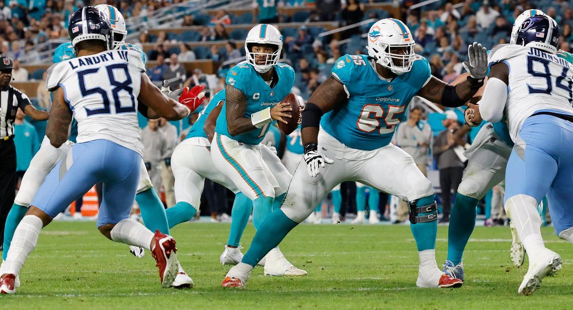 Miami Dolphins quarterback Tua Tagovailoa (1) sets up to pass in the second half against the Tennessee Titans at Hard Rock Stadium in Miami Gardens, Florida on Monday, December 11, 2023.