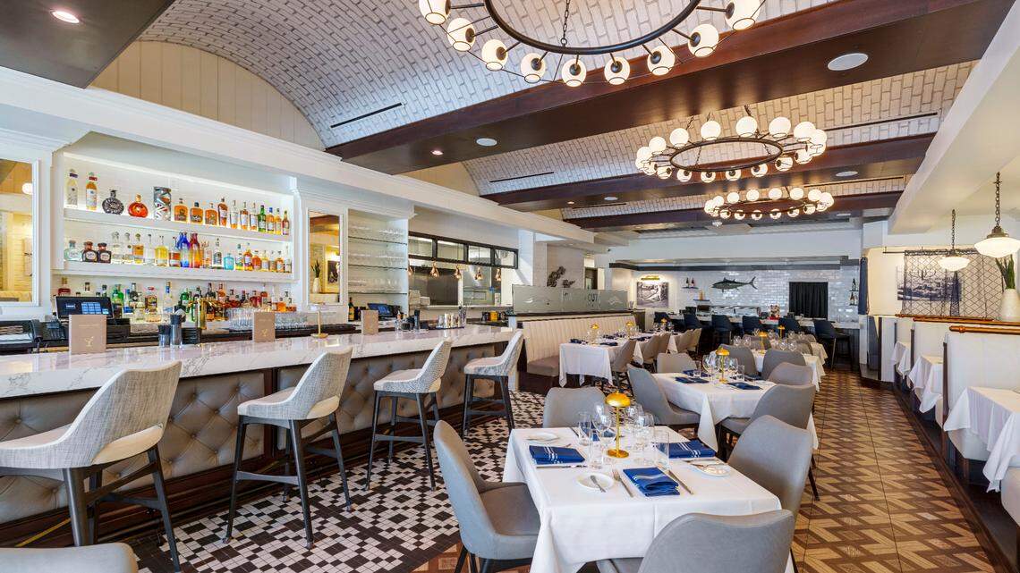 The downstairs dining room at Catch & Cut, a new steak and seafood restaurant from Chef Andre Bienvenu, who spent 26 years in the kitchen at Joe’s Stone Crab in Miami Beach.