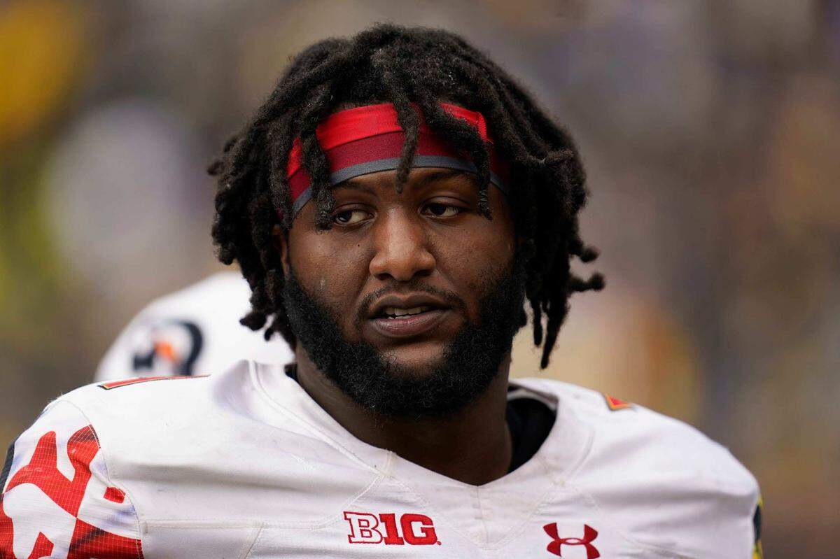 Maryland offensive lineman Jaelyn Duncan watches in the second half of an NCAA college football game against Michigan in Ann Arbor, Mich., Saturday, Sept. 24, 2022. (AP Photo/Paul Sancya)