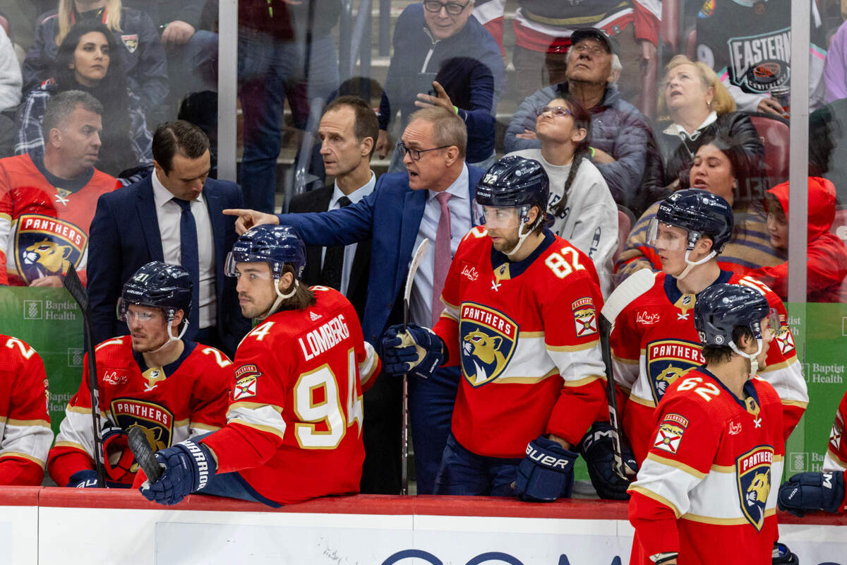 Florida Panthers Head Coach Paul Maurice speaks to an official during the third period of an NHL game against the New York Rangers at Amerant Bank Arena in Sunrise, Florida, on Friday, December 29, 2023.