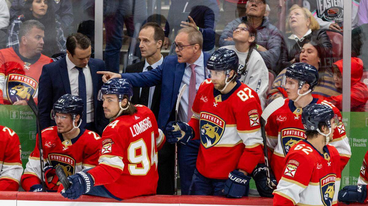 Florida Panthers Head Coach Paul Maurice speaks to an official during the third period of an NHL game against the New York Rangers at Amerant Bank Arena in Sunrise, Florida, on Friday, December 29, 2023.