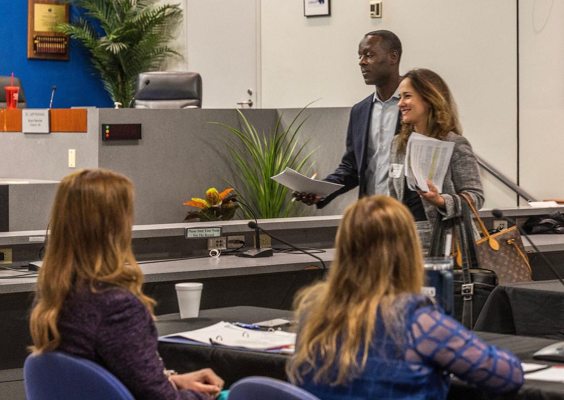 Howard Hepburn, the new superintendent of the Broward County Public Schools and his lawyer Carmen Manrara Cartaya, walk out to privately conference during a meeting to negotiate his new contract with the school board general counsel Marilyn Batista (right) and the board Chair Lori Alhadeff, at the school board offices, on Friday April 26, 2024.