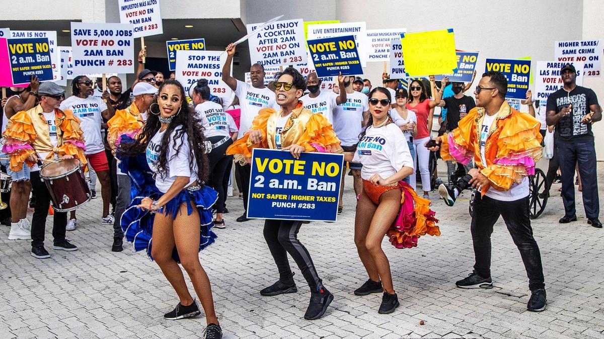 A group of hospitality workers marched to Miami Beach City Hall on October 27, 2021, to oppose a referendum that proposes to stop alcohol sales at 2 a.m. citywide on Wednesday.