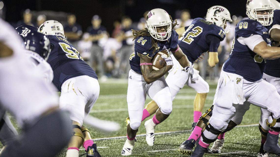Florida International University running back D’Vonte Price (24) charges down the field during the 2nd quarter in a football game against Rice University at Riccardo Silva Stadium in Miami, FL, on Saturday, October 20, 2018.