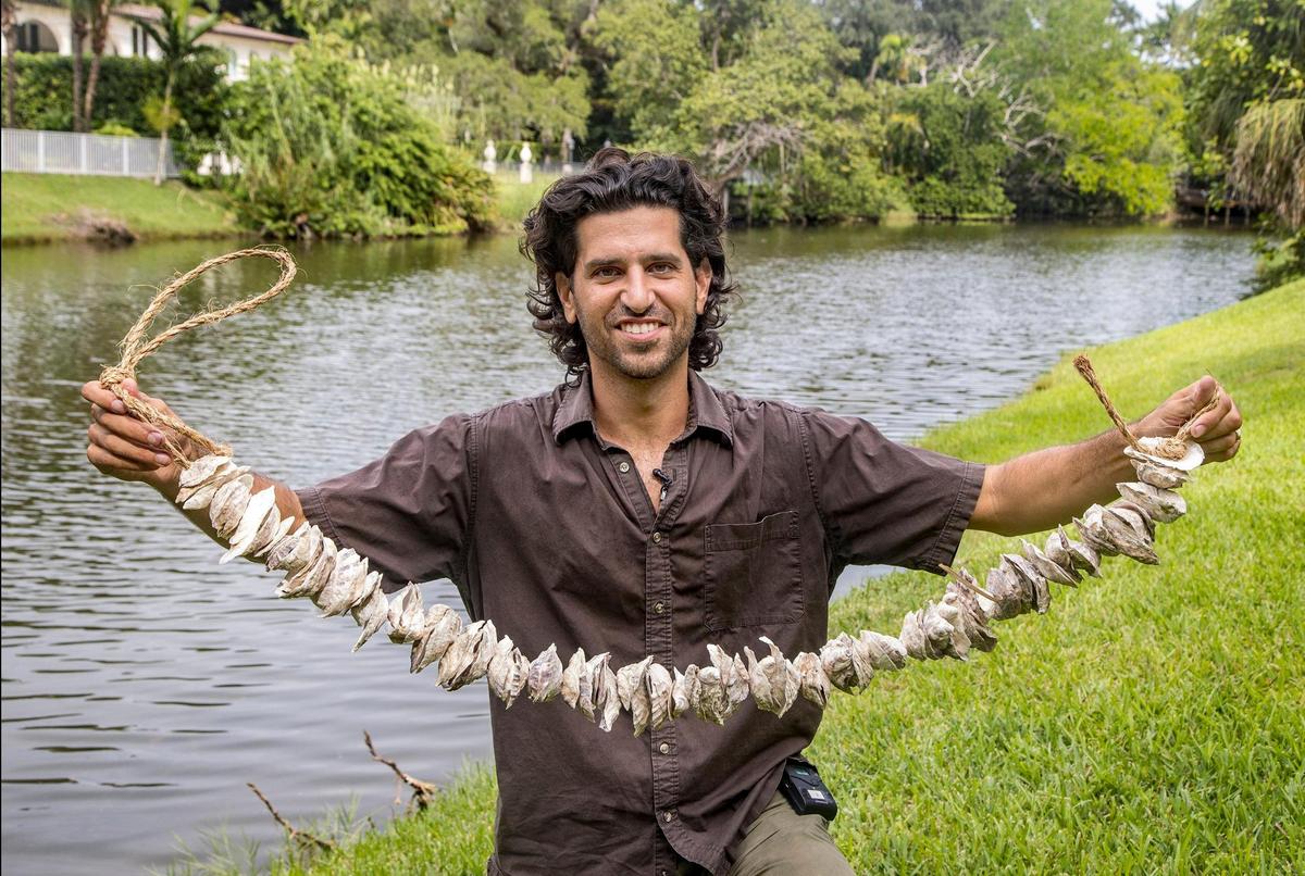Alberto “Tico” Aran, Founder of the Watershed Action Lab, displays a line made with oyster shells collected from local restaurants as he talks about the Native Oyster Restoration Project to Biscayne Bay, he leads to improve the quality of the water entering Biscayne Bay as a tool to mitigate algal blooms, on Friday October 8, 2021