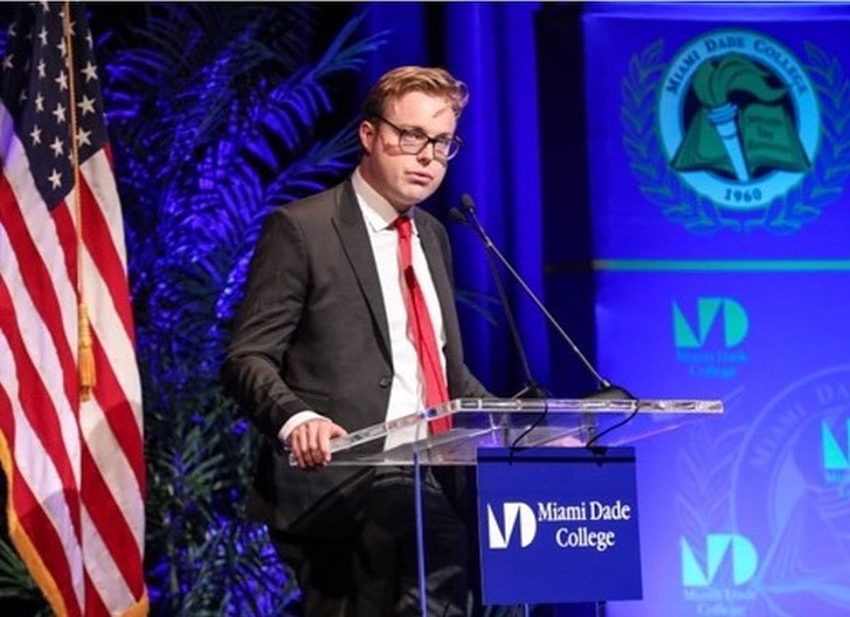 Jon Hartley giving the introduction at an Economic Club of Miami event on November 7, 2022 featuring Kenneth Griffin of Citadel and Miami Mayor Francis Suarez.  Held at Miami Dade College. 