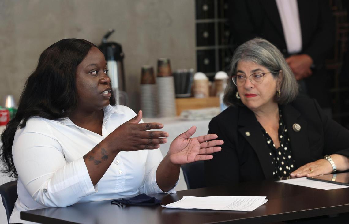 Shantay Davis, left, speaks to Mayor Daniella Levine Cava and other parents during an affordable housing roundtable at United Way Center for Excellence in Early Education on Tuesday, July 12, 2022, in Miami.