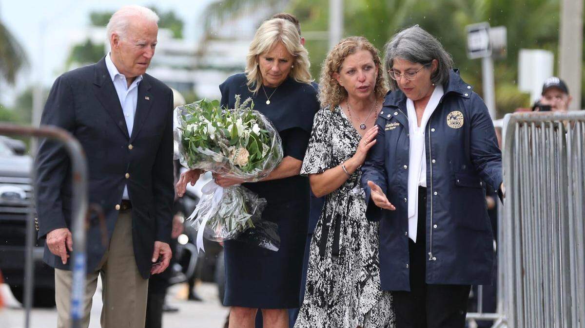President Joe Biden and first lady Dr. Jill Biden visit the memorial in Surfside on Thursday, July 1, 2021.