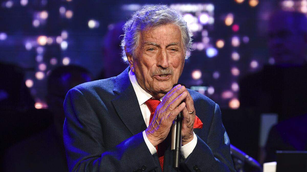 FILE - Singer Tony Bennett performs at the Statue of Liberty Museum opening celebration in New York on May 15, 2019. Bennett has been diagnosed with Alzheimer’s disease but the diagnosis hasn’t quieted his legendary voice. The singer’s wife and son reveal in the latest edition of AARP The Magazine that Bennett was first diagnosed in 2016. The magazine says he endures “increasingly rarer moments of clarity and awareness.”