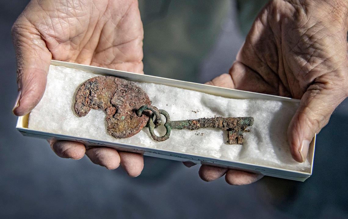 Archaeologist Bob Carr holds a Royal Palm Hotel key excavated at the site where Met Square now stands, 340 SE Third St. in downtown Miami.
