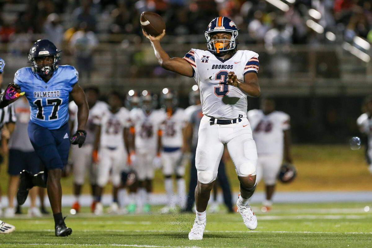 Homestead Broncos quarterback Joshua Townsend (3) throws a pass during the second quarter of a high school football game against the Palmetto Panthers at Tropical Park Stadium in Miami, Florida, Thursday, August 25. 2022.