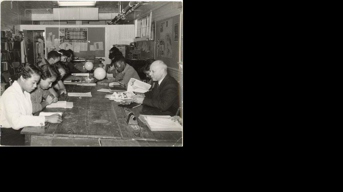 
Professor Ernst Borinski teaching in the Social Science Lab, Tougaloo College, MS, ca. 1960. Prof. Borinski, a refugee from Germany, was part of the Tougaloo community for 36 years. In the Social Science Lab, students were encouraged to think critically and question social attitudes, prejudices, and race relations. His tombstone in the campus cemetery reads: "Ernst Borinski, Inspiring Teacher." Courtesy of Mississippi Department of Archives and History. Beyond Swastika and Jim Crow: The Coral Gables Museum and Florida International University collaborated on a new exhibit that highlights the time when Jewish professors escaped anti-Semitism in Europe and landed in Southern Black colleges, experiencing a whole of sphere or racism. The exhibit is on display at the Coral Gables Museum on Wednesday, October 1, 2014.
