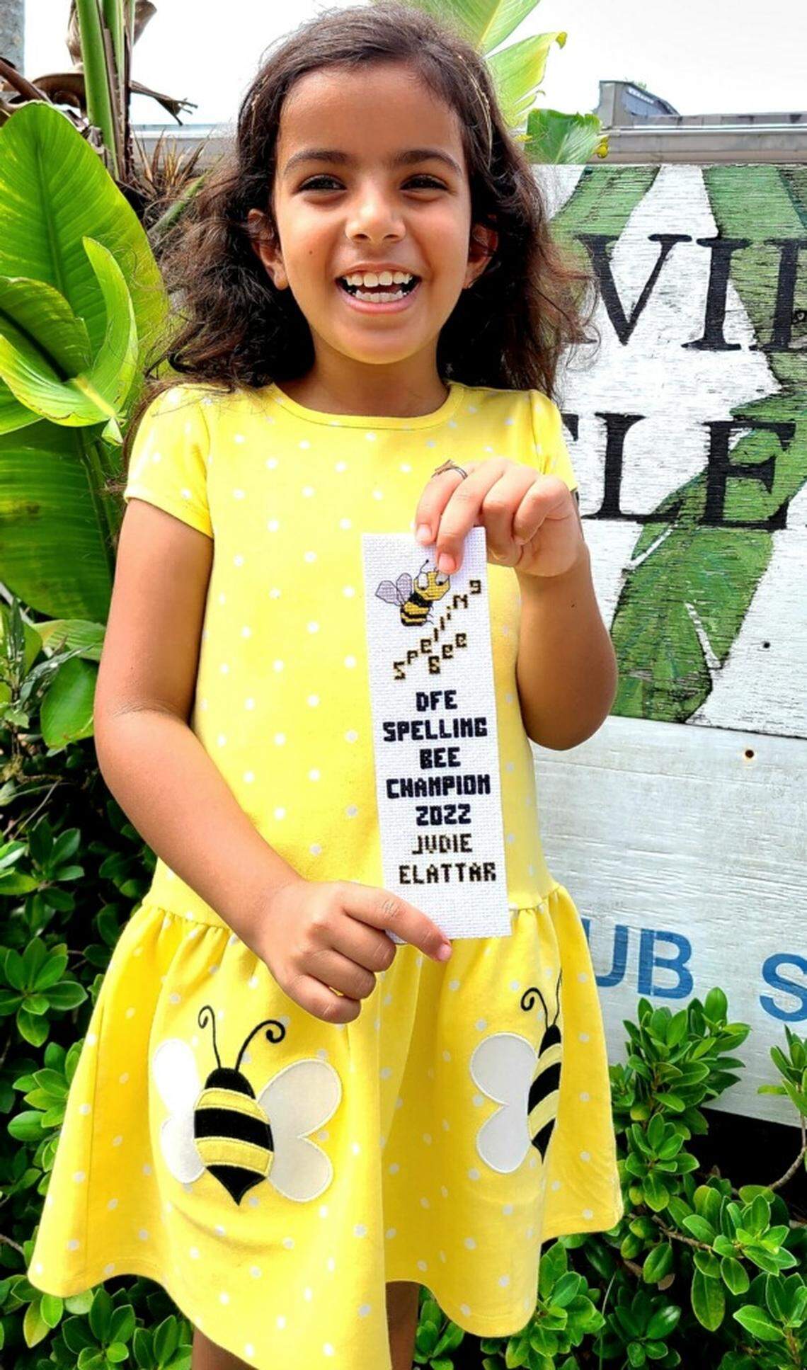 Judie ElAttar posing after winning her David Fairchild Elementary School.