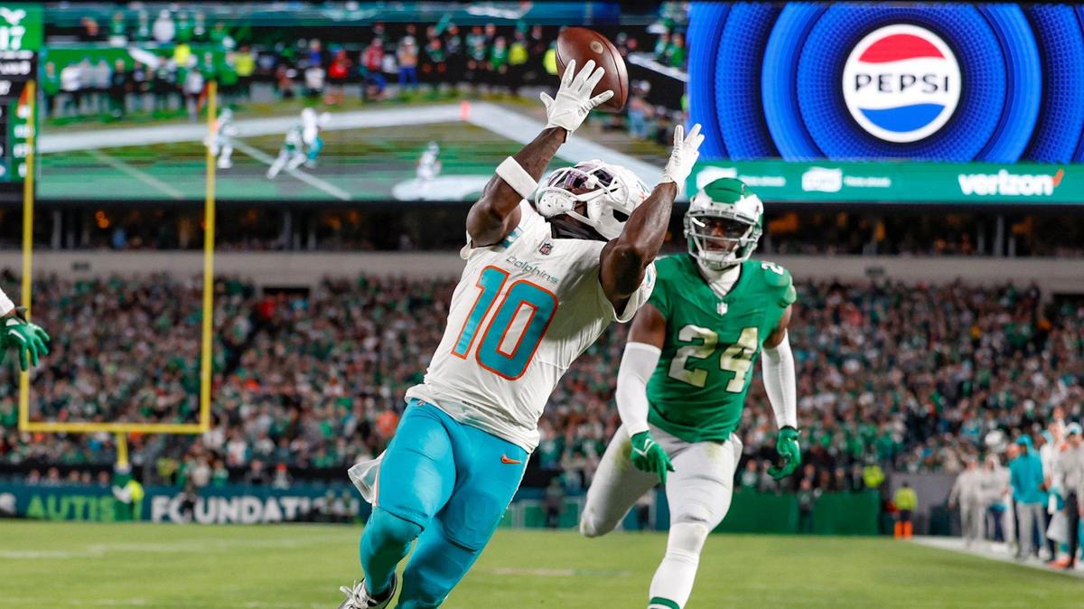 Miami Dolphins wide receiver Tyreek Hill (10) scores late in the second quarter as Philadelphia Eagles cornerback James Bradberry (24) gives chase at Lincoln Financial Field, Philadelphia, PA on Sunday, October 22, 2023.