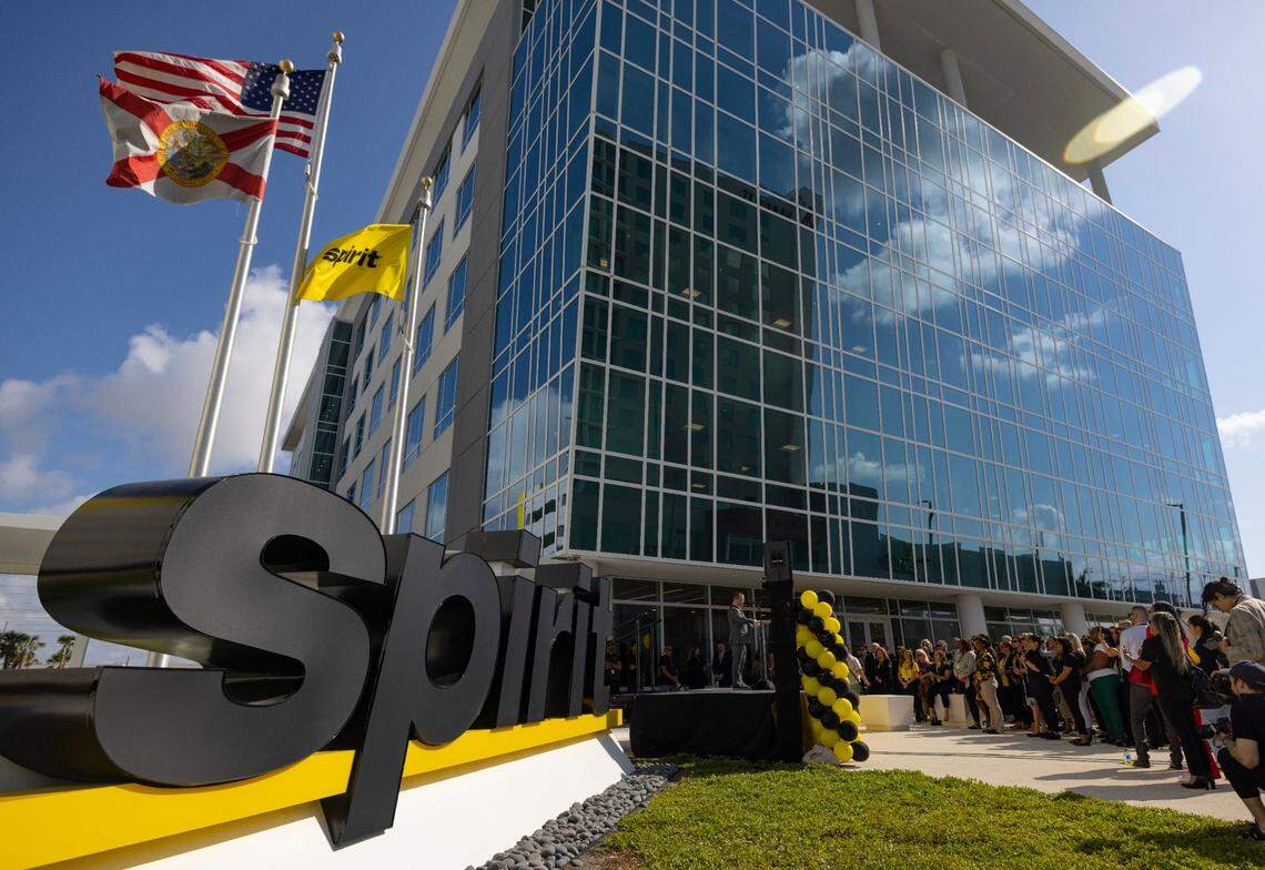 Employees attend the opening of Spirit Airlines new campus outside the support center on Thursday, April 18, 2024, at Dania Pointe in Dania Beach.