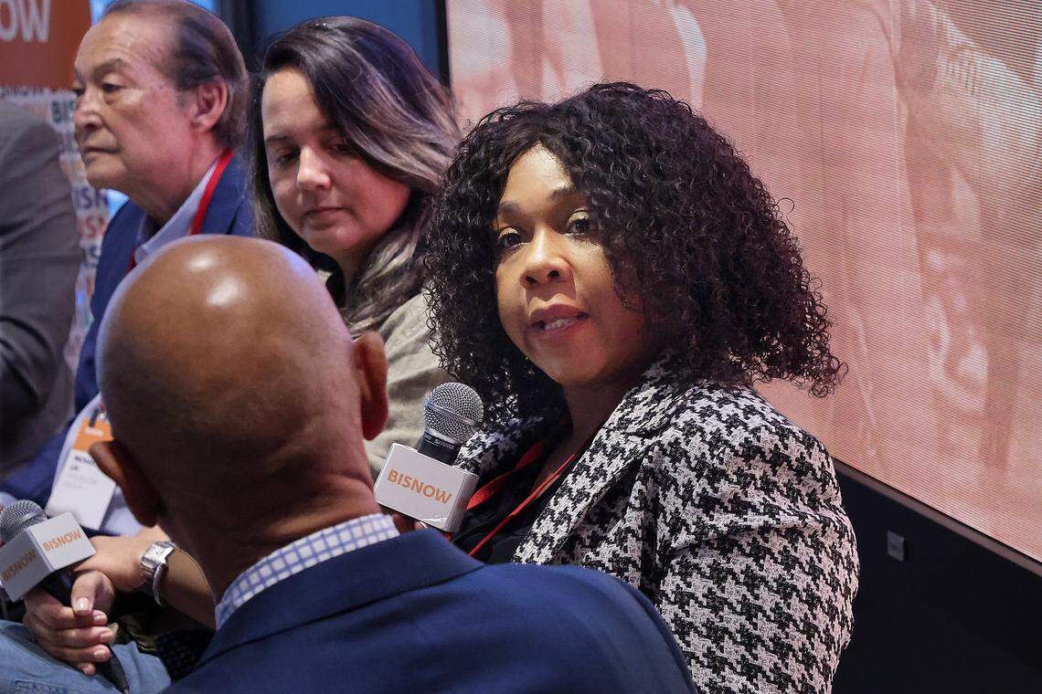 President /CEO of the Little Haiti Revitalization Trust, right, Joann Milord, answers the question by moderator G. Eric Knowles, right, poses question to panelists.The Bisnow conference on the future of Little Haiti and Little River brought together developers, community leaders, business owners, and policymakers to discuss redevelopment, investment, and preservation in these rapidly changing neighborhoods. Panelists addressed topics including affordable housing, cultural preservation, economic opportunity, and the impact of new projects on longtime residents on Thursday, April 23, 2026, in Miami, Florida. 