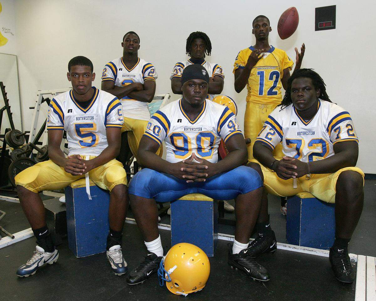 Northwestern Senior High School Football players from left: (1st row) Tommy Streeter (#5), Benjamin Jones (#90), Brandon Washington (#72), (second row from left) Aldarius Johnson (#2), Sean Spence (#31) and Jacory Harris (#12).