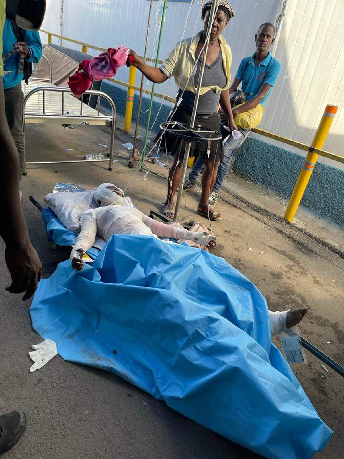 Bandaged victims of a fuel tanker explosion in Haiti’s second largest city, Cap-Haitien, crowded the floor of the largest public hospital Justinien University Hospital on Tuesday, December 14, 2021 as doctors and nurses faced a shortage of supplies,
