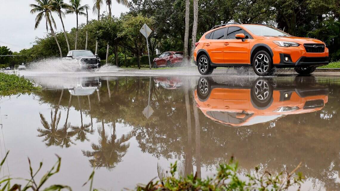Heavy deluge swamps South Florida roads and overflows sewage systems