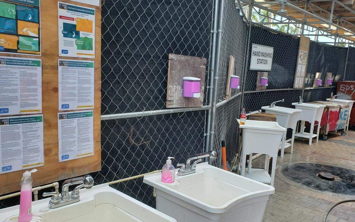 A row of hand washing stations at the PMG construction site at 400 Biscayne Blvd., where the company is building a 49-story apartment building.