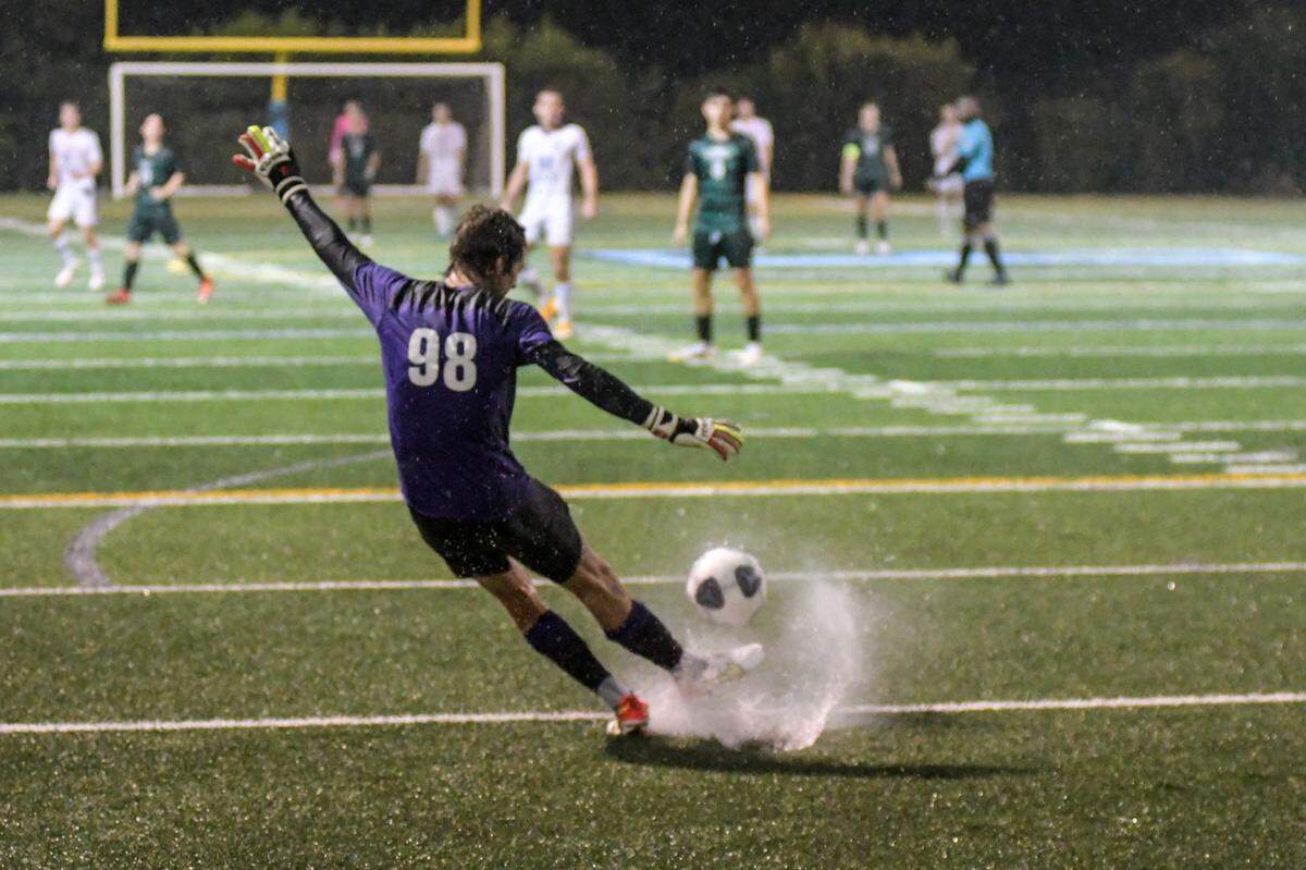 Ransom Everglades goalkeeper Jasper Broad kicks the ball during a state semifinal against Jacksonville Bolles on Saturday, Feb. 19, 2022.