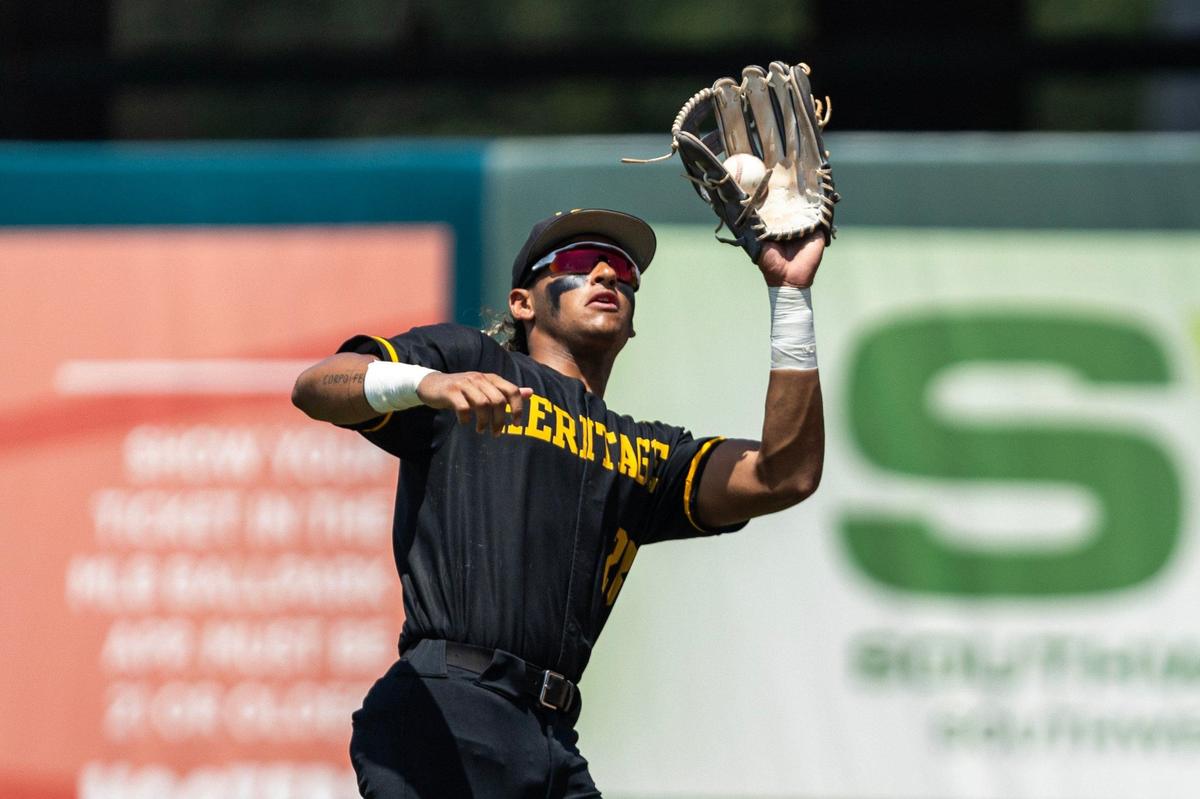 American Heritage outfielder Lucas Ramirez (28) makes the catch in right field during the Class 5A state baseball championship game against Jesuit Tigers at Hammond Stadium on Saturday, May 18, 2024, in Fort Myers, Fla.