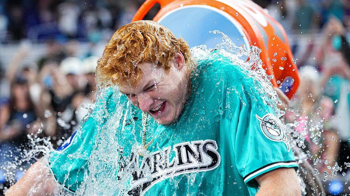 MIAMI, FLORIDA - MARCH 29: Owen Caissie #17 of the Miami Marlins gets a gatorade bath after hitting a walk-off home run against the Colorado Rockies during the ninth inning at loanDepot park on March 29, 2026 in Miami, Florida. (Photo by Rich Storry/Getty Images)