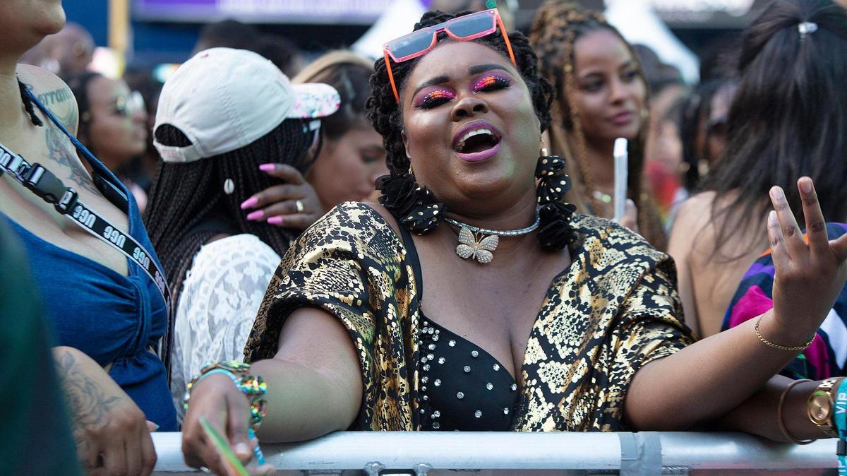 Fan sings at the inaugural Afro Nation Miami at loanDepot Park in Miami, Florida on Saturday, May 27, 2023.