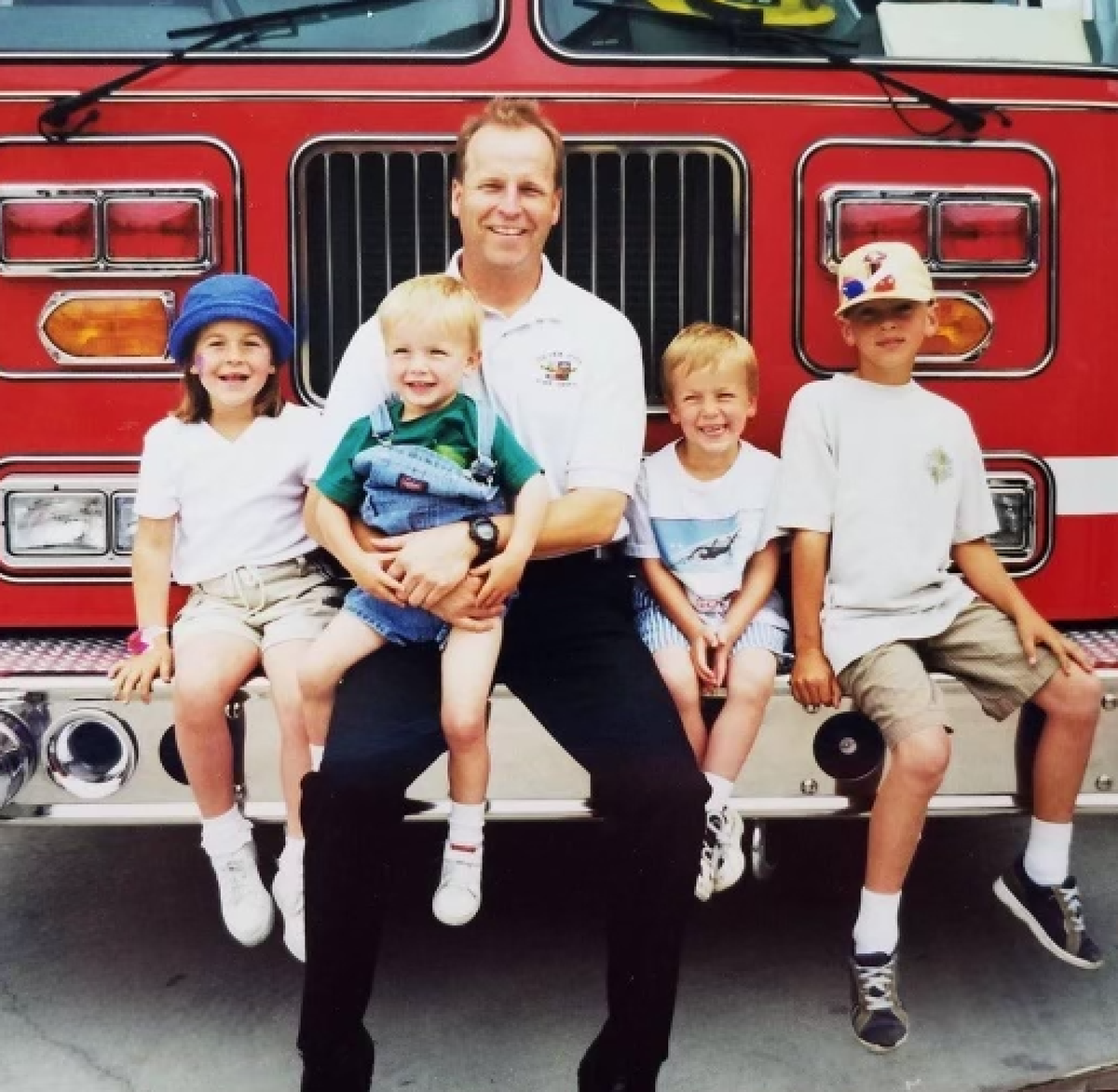 Mark Nance with his four children. A young Tommy Nance, now a reliever with the Miami Marlins, is at far right.