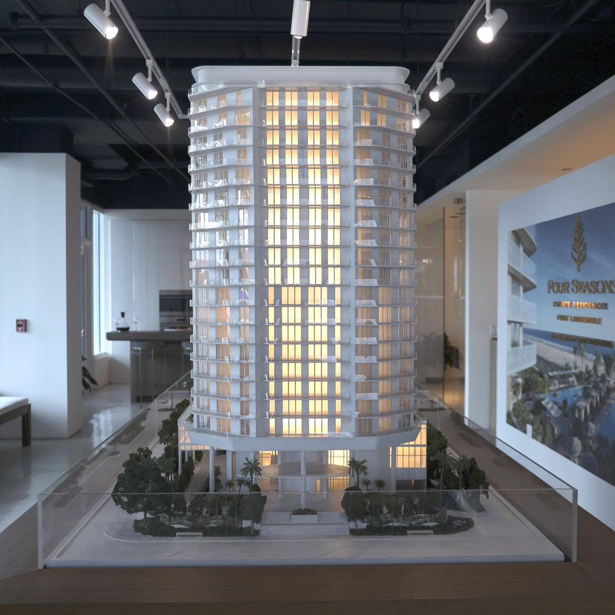 Ramola Motwani, chairwoman and CEO of Merrimac Ventures, and her two sons Dev and Nitin Motwani are the developers of the Four Seasons Fort Lauderdale Beach.  The model of the building is displayed inside the sales center  on Dec. 18, 2019.