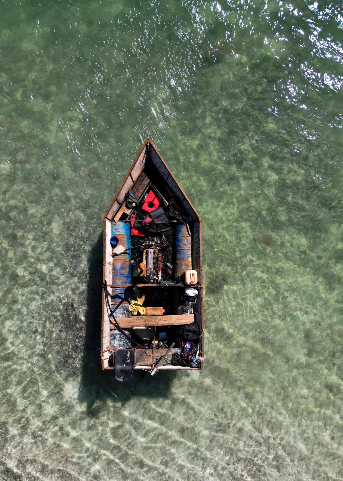 A vessel used by Cuban migrants floats off Duck Key in the Florida Keys on Jan. 14, 2023.